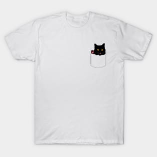 Cute black cat looks out of pocket and shows paw T-Shirt